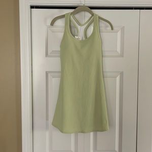 HALARA tennis dress XS. New. Never worn. Runs a bit long, approx. 30.5 inches.